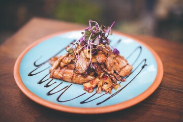 Poster - Delicious meat dish on a plate with style