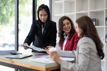 Wall Mural - business adviser meeting to analyze and discuss the situation on the financial report in the meeting room.Investment Consultant, Financial advisor and accounting concept