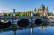 Bridge On Spree River Canal And Berlin Cathedral In Germany