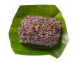 Black sesame sticky rice wrapped in banana leaves on white background, Northern Thailand snack food.