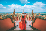 Fototapeta Miasto - Traveler asian woman with dress travel in temple at Lampang Thailand