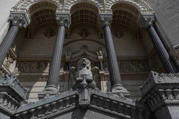 Wall Mural - Low angle shot of the facade of the Basilica of Notre-Dame de Fourviere with its gorgeous columns