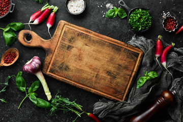 Food background. Spices, herbs and kitchen tools. Top view. free space for your text. Rustic style.