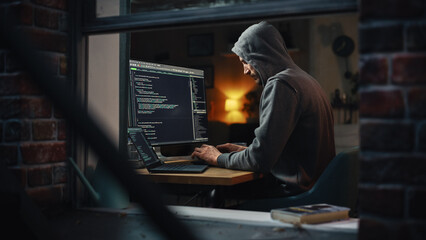 Fototapete - Single-Minded Professional Programmer Obsessively Writing a Code on His Desktop Computer, Late at Night. IT Specialist Ethical Hacker Working on Computer and Finding Software Vulnerabilities.