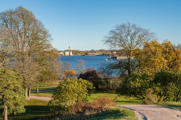 Wall Mural - View of The Kaivopuisto park, Gulf of Finland and Suomenlinna on the background in autumn, Helsinki, Finland