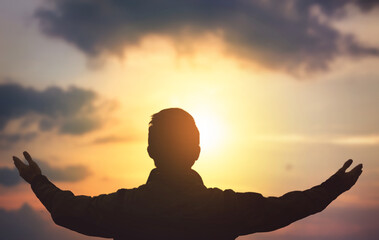 Wall Mural - man rise hand up on top of mountain and sunset sky abstract background
