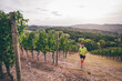 © Giorgio Pulcini - Man running in the vineyards of Langhe