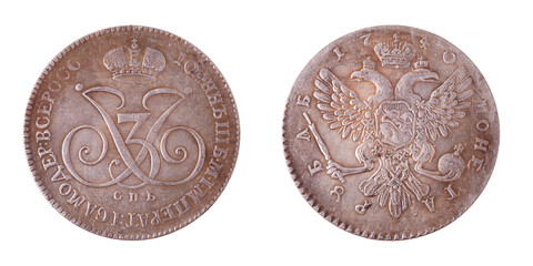 A Russian silver coin with a value of 1 ruble in 1740. Two sides of the coin on a white background. Isolated