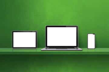 Poster - Laptop, mobile phone and digital tablet pc on green wall shelf. Horizontal background