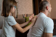 © Nenad - Father getting a massage