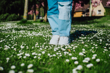 Wall Mural - child playing on the grass