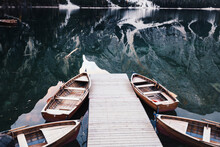 Wooden Boats At The Alpine Mountain Lake. Lago Di Braies