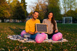 couple celebrates the birth of the baby in the park