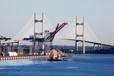 Fototapeta Do pokoju - Jacksonville City Port And A Suspension Bridge