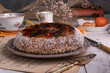 Rosca de reyes, king cake, glazed fruit, Provencal Galette des rois on a wooden table