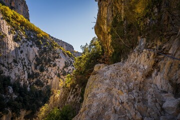 Sticker - Rugged mountains with green vegetation in the Blanc-Martel trail in La Palud-sur-Verdon, France