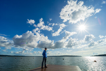 Wall Mural - sky with sun light over the river on a clear day