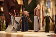 © DragonImages - Shopping Assistant Showing Bags
