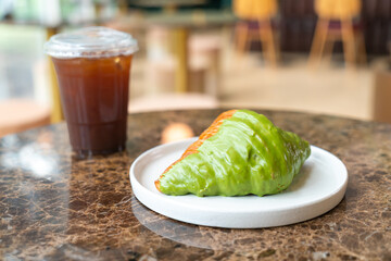 Poster - matcha green tea croissant on plate