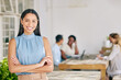 © S Fanti/peopleimages.com - Portrait of a creative woman working in an outdoor garden with a team on a business project. Happy, professional and corporate leader standing outside the company office doing teamwork with workers.