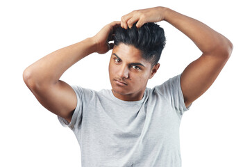 Wall Mural - Studio shot of a young man putting his fingers through his hair against isolated on a transparent png background