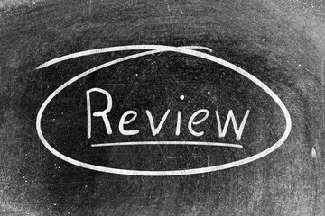 Sticker - White chalk hand writing in word review on blackboard background