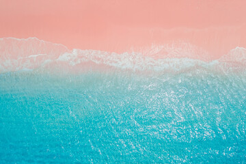 Tropical pink beach with crystal blue ocean. Aerial view of holidays beach on Komodo islands