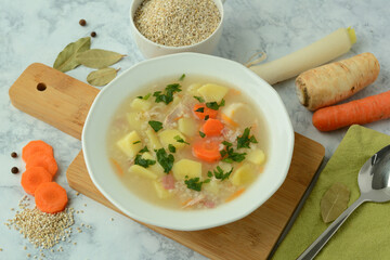 Wall Mural - Krupnik, traditional Polish barley soup with vegetables in a bowl