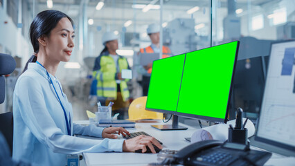 Leinwandbilder - Factory Office Facility: Industrial Engineer Drafting Blueprints of a Heavy Industry Machine Parts on a Computer CAD Software. One Computer Monitor Display is a Green Screen Mock Up Template.