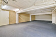 © ADDICTIVE STOCK - Spacious empty room basement