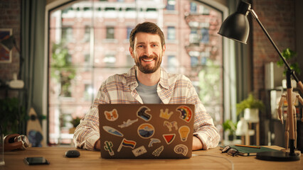 Fototapete - Creative Man is Happy About a Great Solution He Arrived After Careful Consideration. Project Manager Working from Home, Writing a Marketing Project on Laptop Computer.