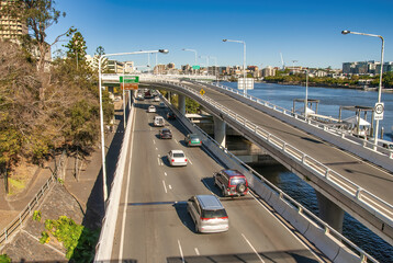 Wall Mural - City traffic along Brisbane River on a major city road