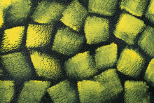 Seamless Pattern With Yellow Paint On Green Leather Texture