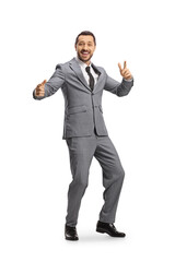 Wall Mural - Cheerful professional man in suit dancing