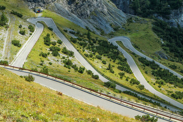 The detail of the hairpins of the challenging road towards the famous Stelvio Pass in the italian Alps, close to Switzerland. 