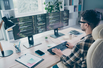 Photo of confident busy programmer wear spectacles typing keyboard framework indoors workplace workshop home