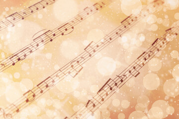 Wall Mural - Paper sheet with musical notes, closeup view. Chirstmas song. Bokeh effect