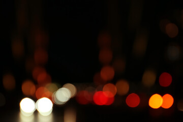 Wall Mural - Blurred view of city lights at night. Bokeh effect