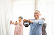 © Wongsakorn - Asian Senior exercising. Group of active asian seniors exercising. group of elderly people having fitness class. Active Asian senior group mix with man and woman exercise