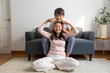 © bennnn - Asian brother and sister hugging with care and love sit on sofa at home.