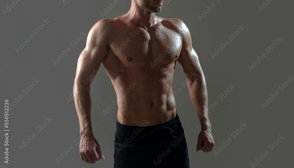 Photo Stock Chest muscles. Muscular shirtless manked man model showing ...
