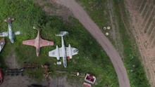 Vertical, Private Collection Of MOD Fleet Vintage Jet Aircraft Preserved On Worcestershire Farmland Aerial View Tilting Up