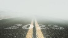 2023 Written On An Empty Asphalt Road And Ahead Is A Thick Fog. For New Year's Vision 2023