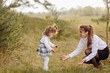 © andriyyavor - beautiful and happy mother and daughter have a good time in the forest