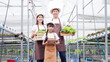 © krongthip - Farmers holding crates of fresh vegetables, organic vegetables.