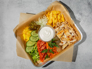 Wall Mural - Shawarma opened on the plate made from chicken closeup top view
