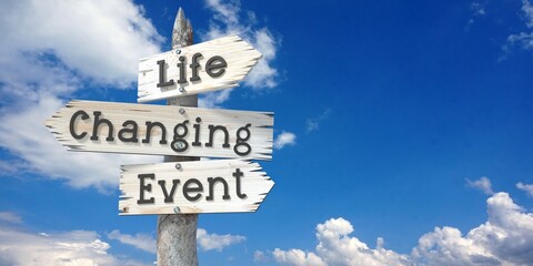 Wall Mural - Life changing event - wooden signpost with three arrows