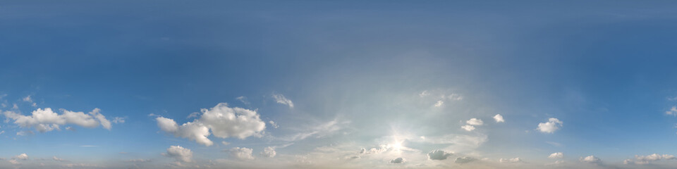 Wall Mural - blue sunset sky with clouds as seamless hdri 360 panorama view with zenith in spherical equirectangu