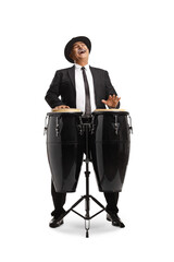 Wall Mural - Cheerful mature man playing conga drums and singing