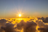 Fototapeta Na sufit - sunset over the clouds